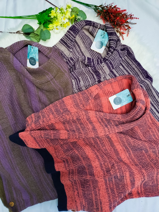 Flatlay photo of 3 handmade British & Merino wool scarves. colours include: Coral & Navy, Lilac purple & gold brown, Plum purple & beige