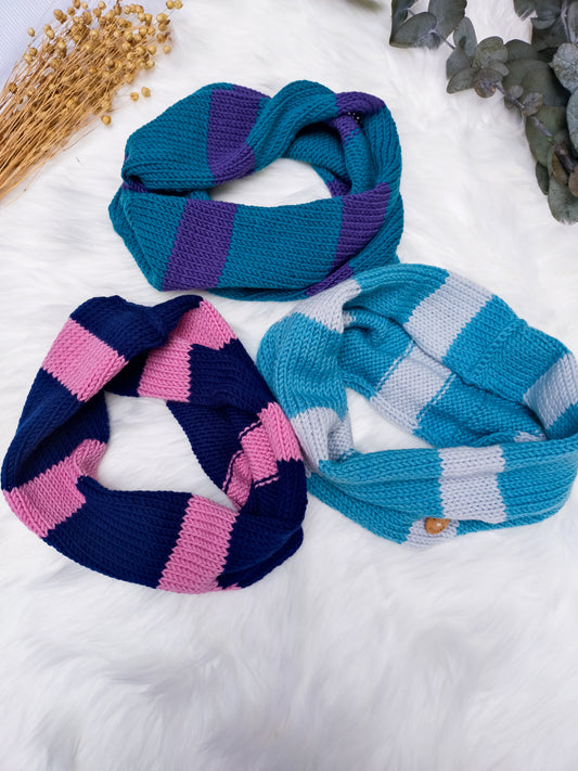 Flatlay photo of 3 bold stripe merino wool neck warmer snood scarves. Colours include:teal blue and plum royal purple, turquoise & sky blue, navy & bubblegum pink