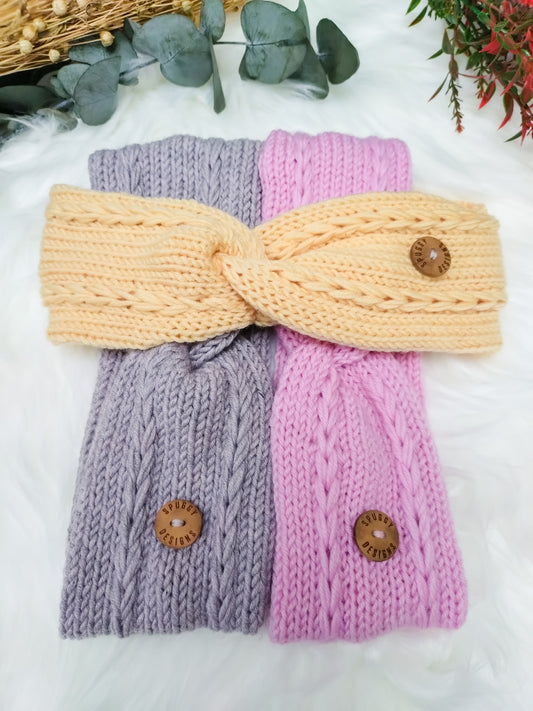 A collection of soft merino headbands, with a braided cable design. Handmade in the UK by sustainable knitwear brand Spuggy Designs. Perfect gift for teens, girlfriends, friends, sisters. Christmas gifts UK